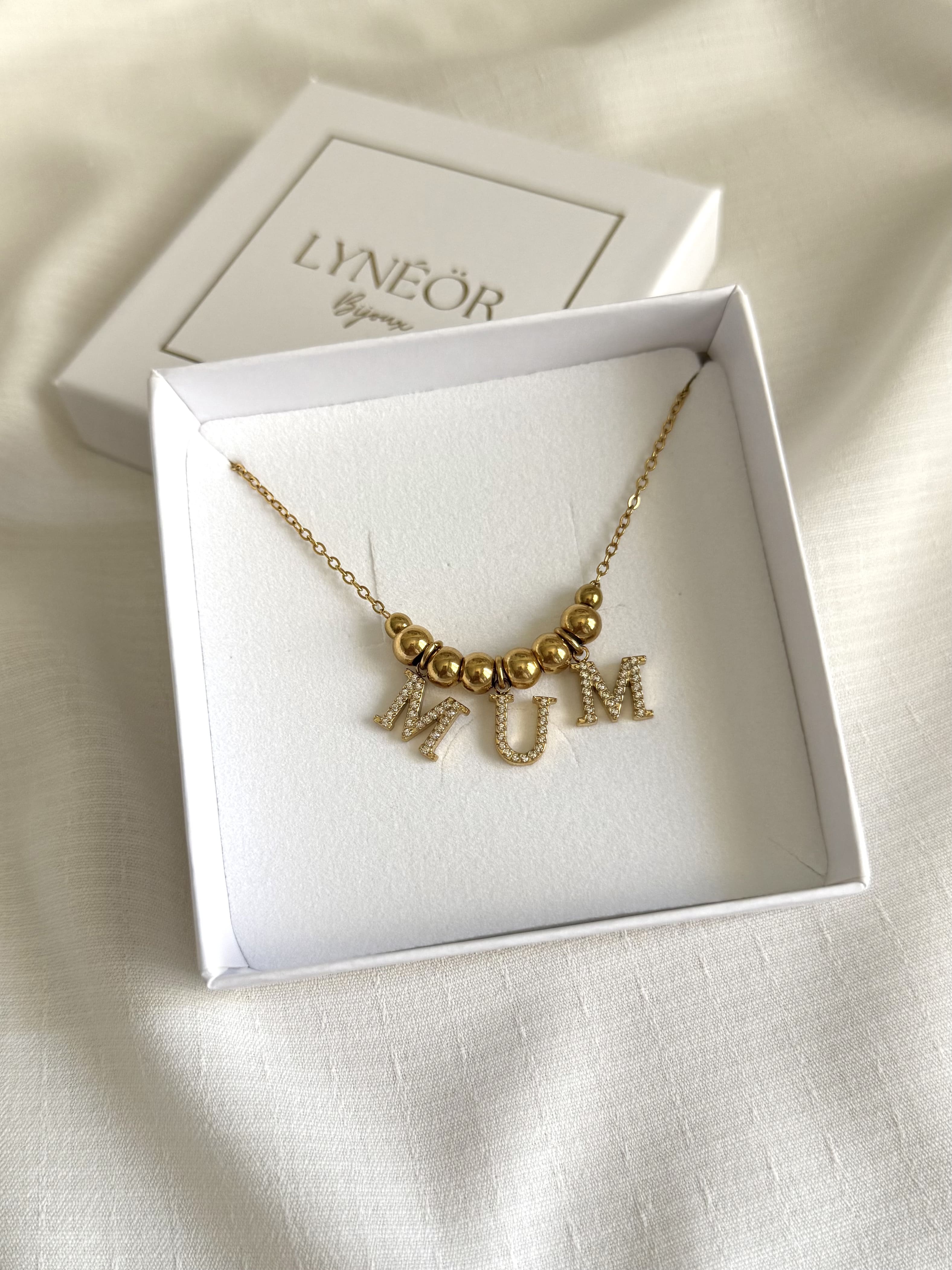 Collier MUM