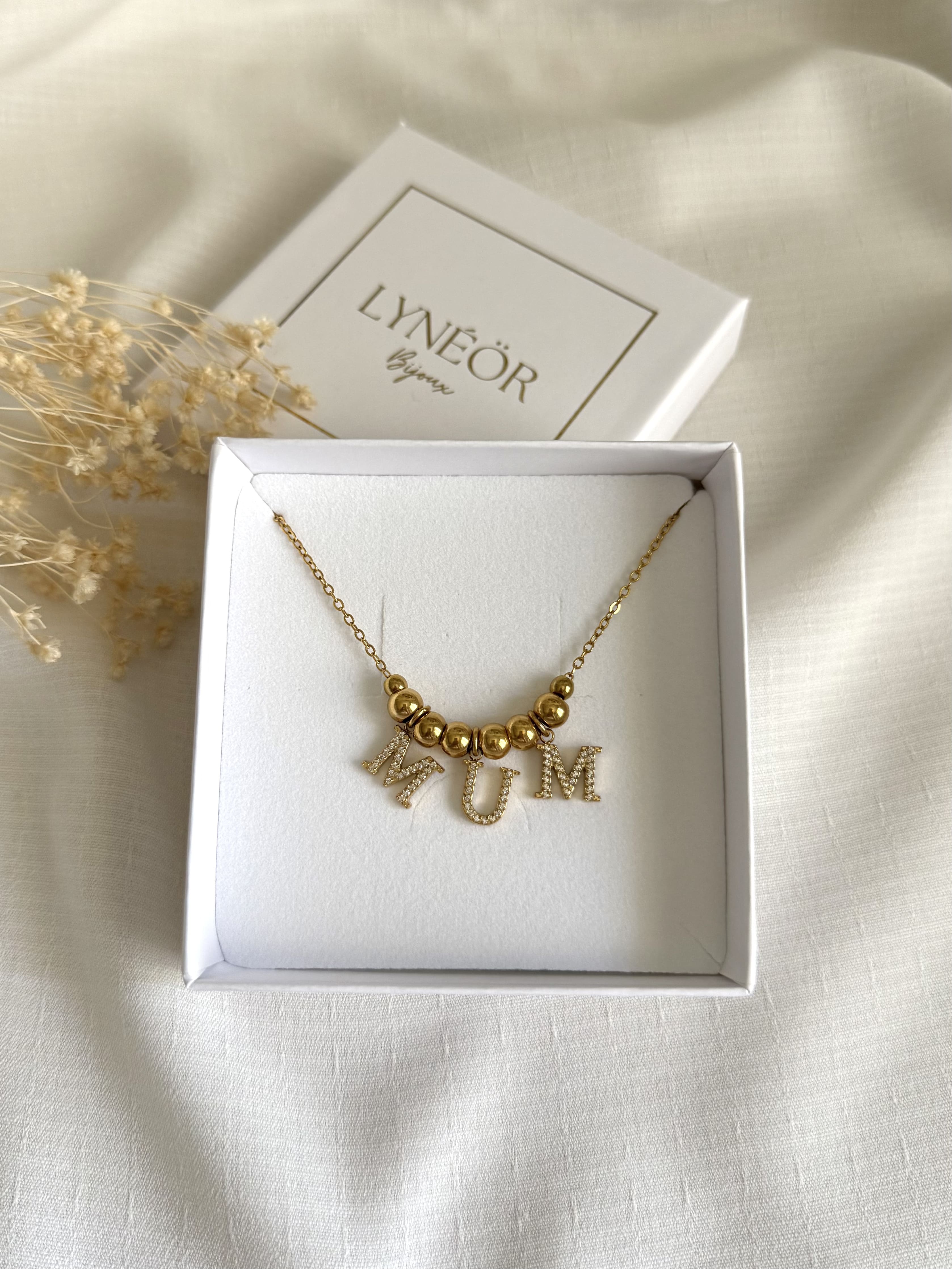 Collier MUM